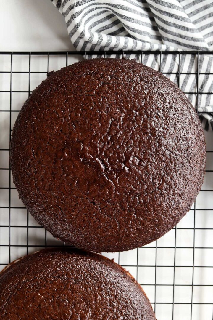 best moist chocolate cake layers cooling on wire rack