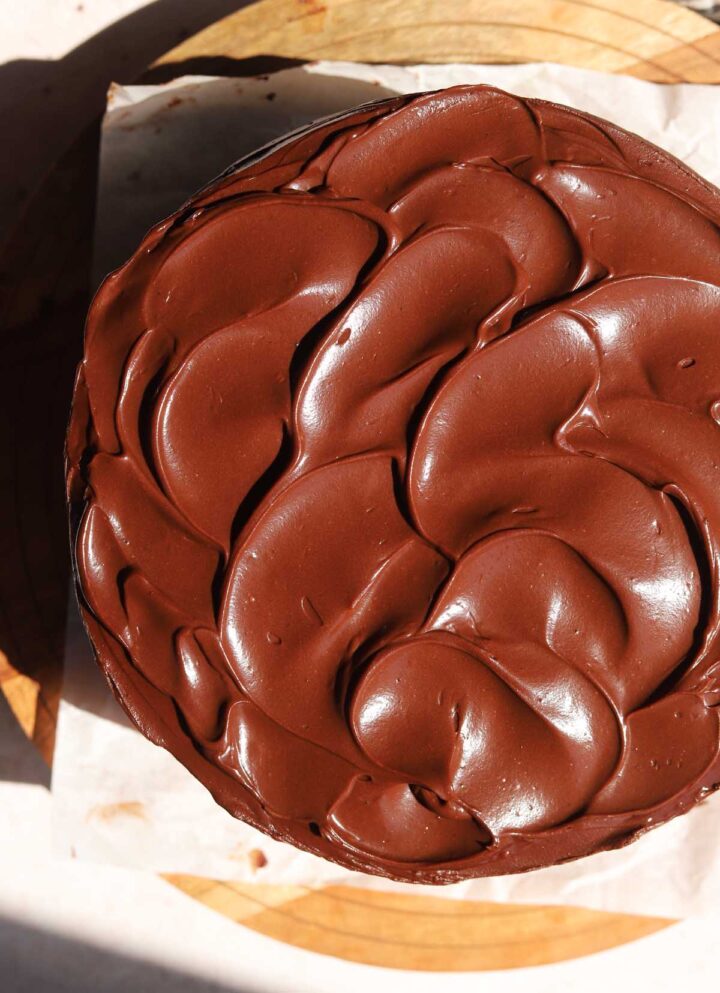 top view of best moist chocolate cake covered in fudgy chocolate frosting