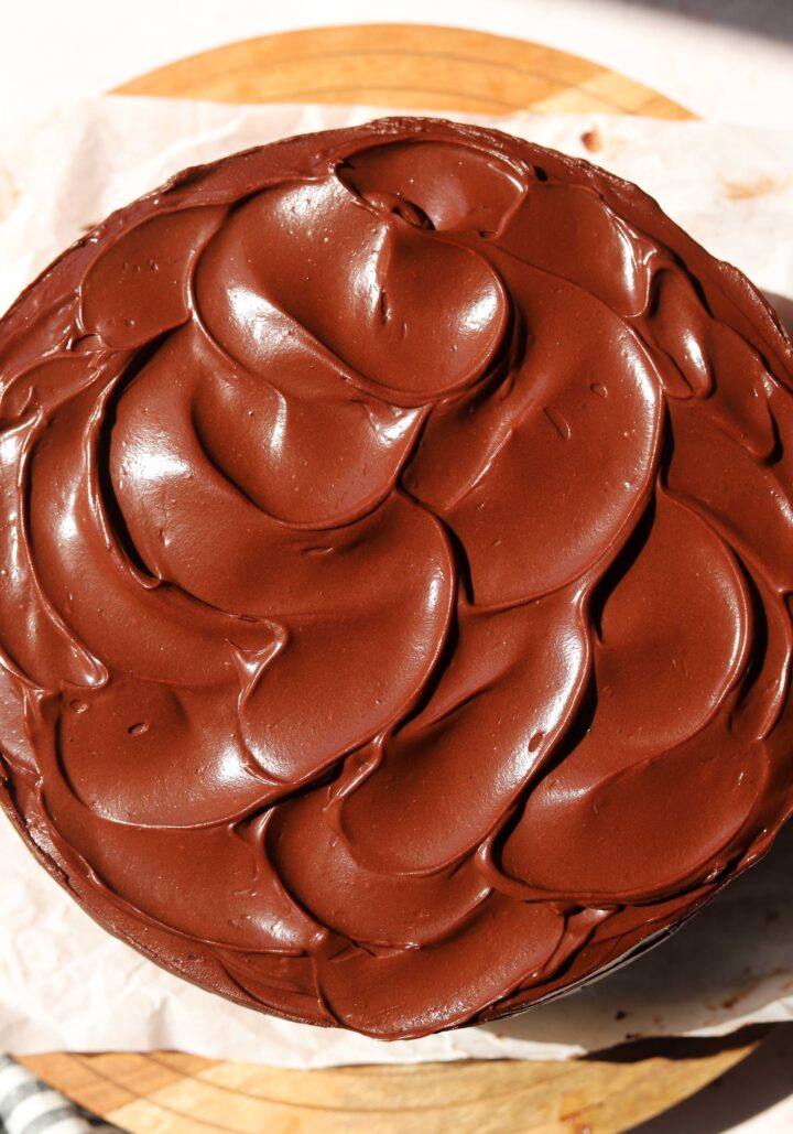 top view of best moist chocolate cake covered in fudgy chocolate frosting