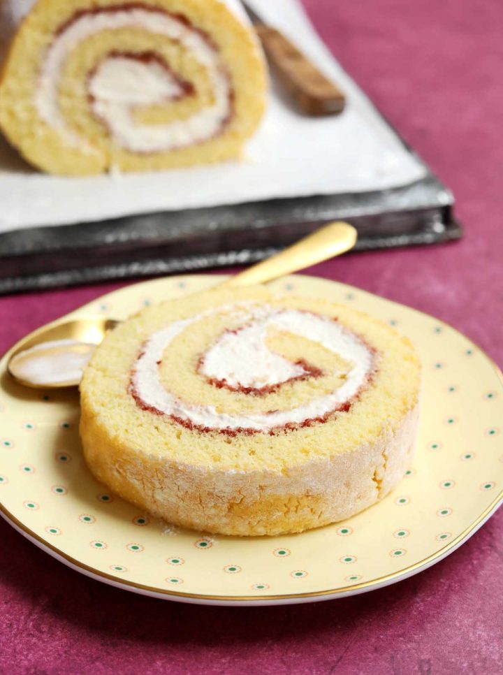 vanilla swiss roll cake on a plate