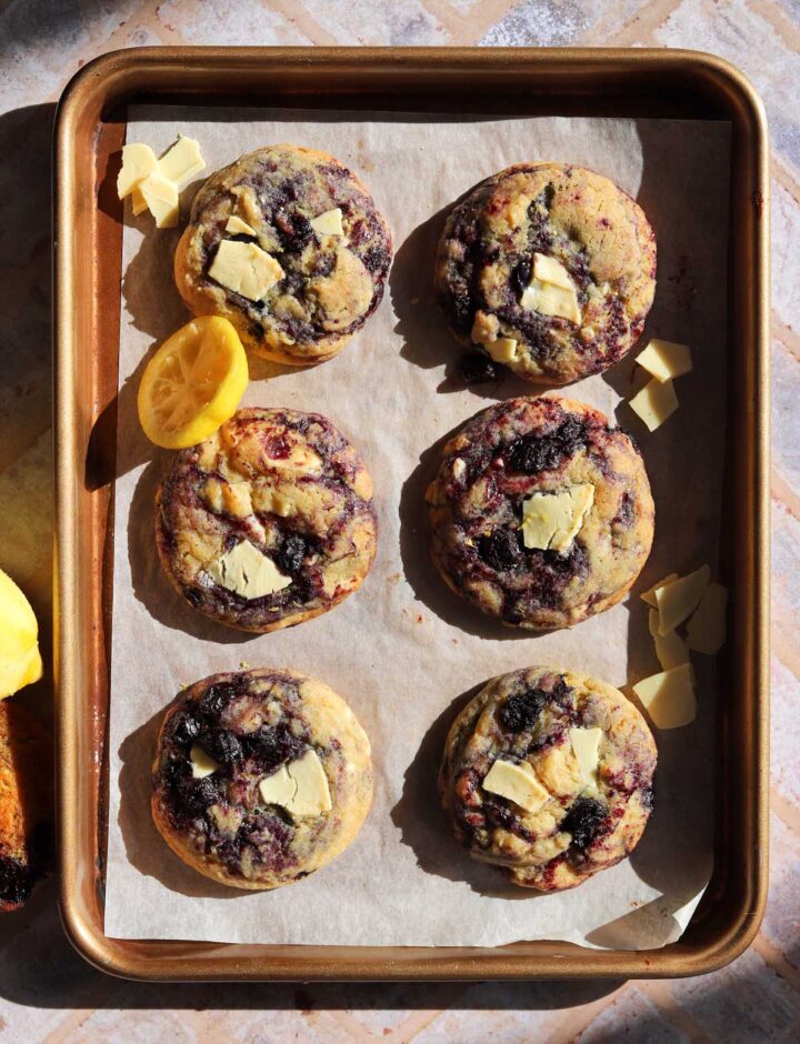 lemon blueberry cookies on baking sheet