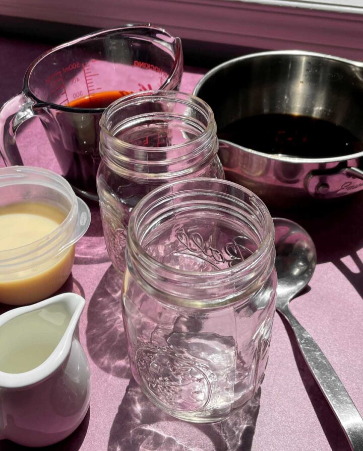 ingredients and glasses to prepare iced Thai tea bubble tea