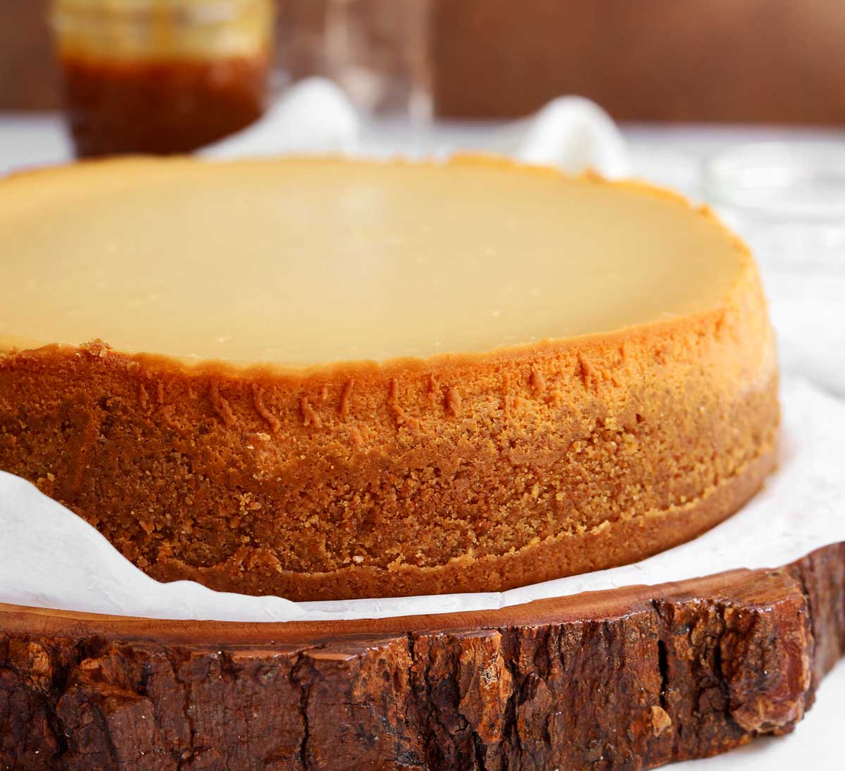 side view of salted caramel cheesecake after cooling