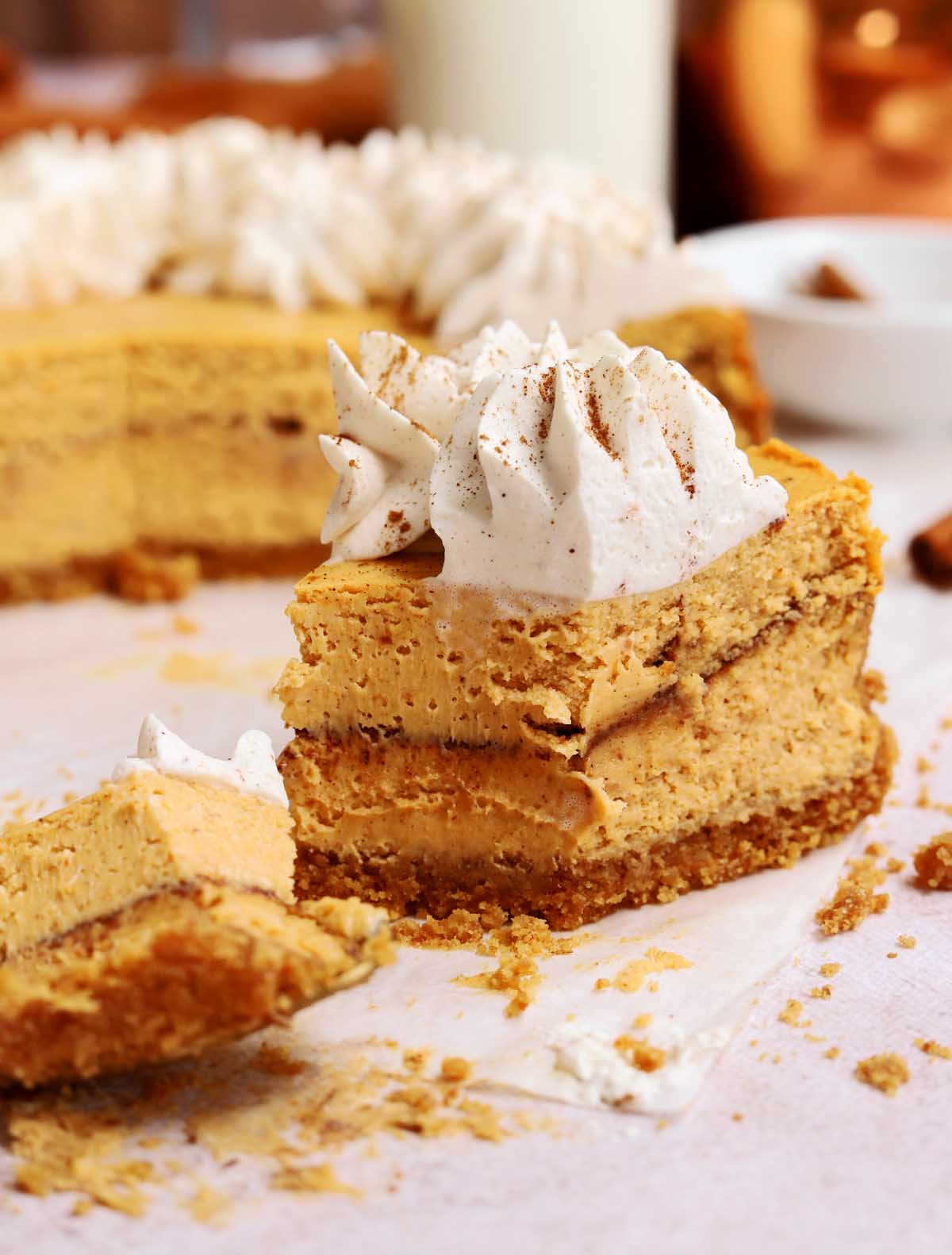 cinnamon swirl pumpkin cheesecake with bite