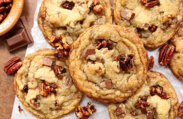 top view of brown butter pecan praline cookies piled up on table