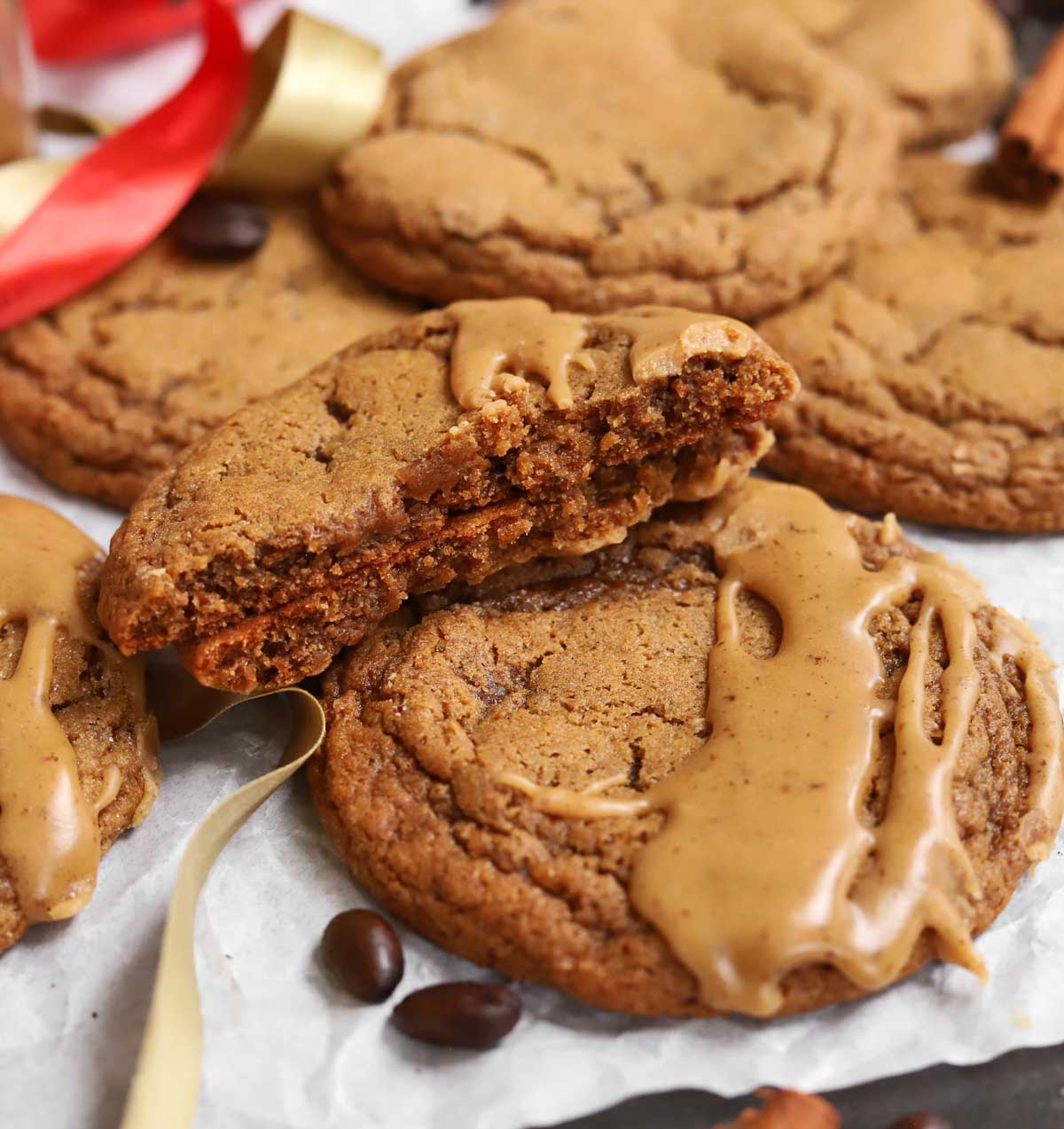 soft gingerbread latte cookies broken in half showing soft insides