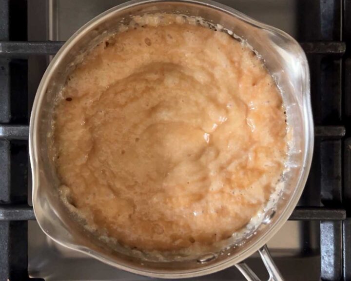 Continue cooking until it turns golden, stirring occasionally.