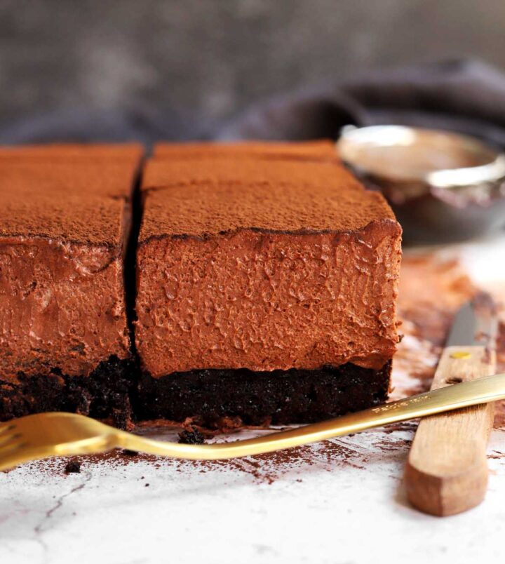 side view of side view of sliced chocolate mousse cake
