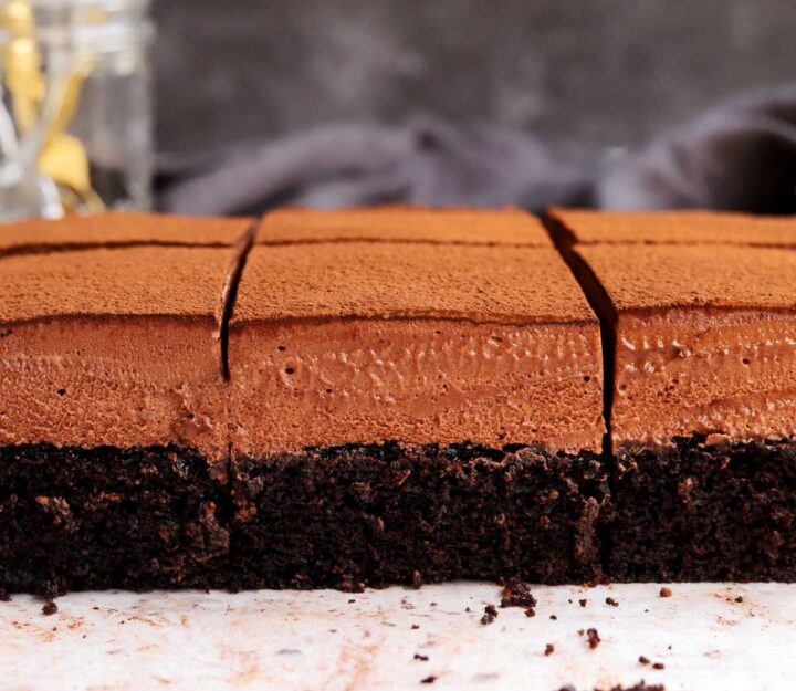 side view of sliced chocolate mousse cake showing cross section