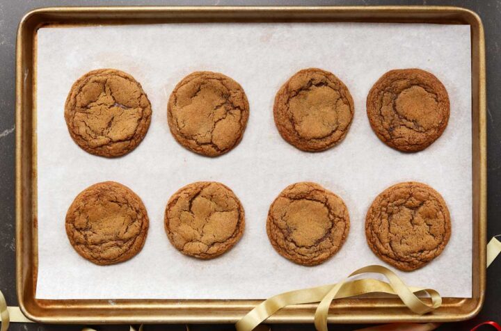 soft gingerbread latte cookies on baking sheet