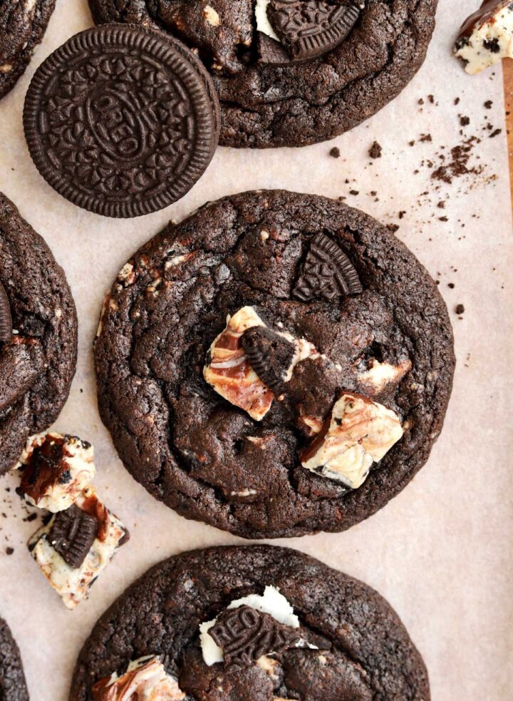 top view of double chocolate cookies and cream cookies on baking sheet