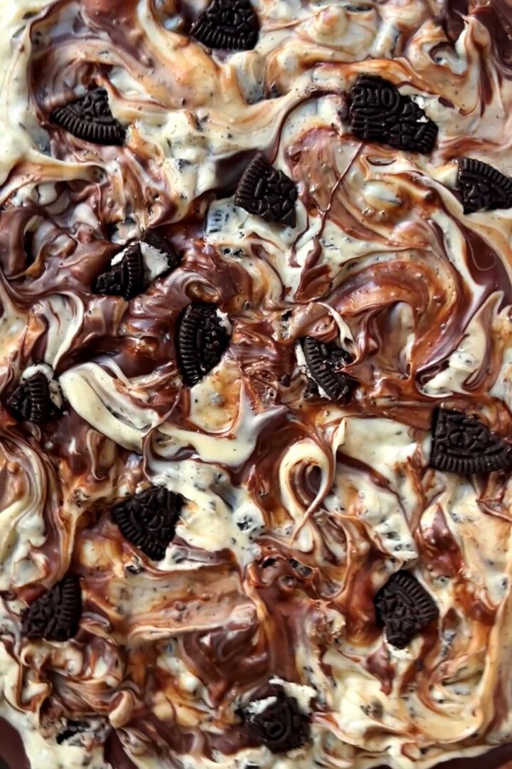 cookies and cream chocolate bark setting on parchment