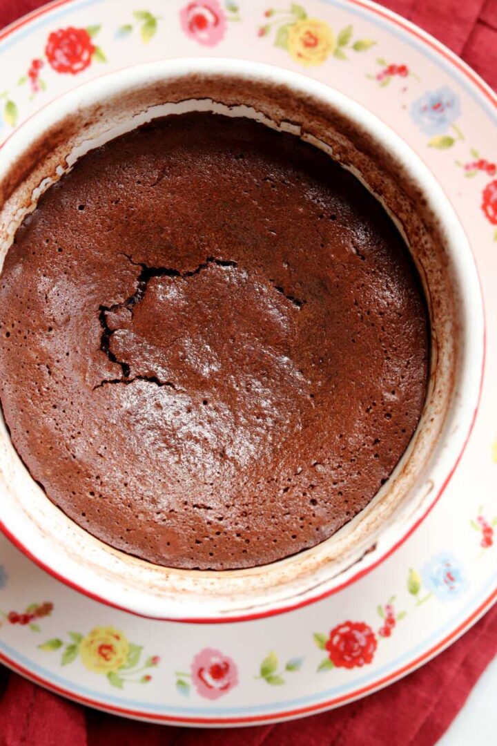 ramekin with baked molten chocolate lava cake inside