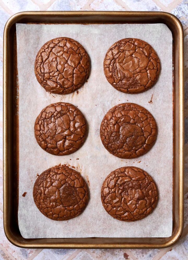 classic fudgy brownie cookies with shiny crinkle top on baking sheet