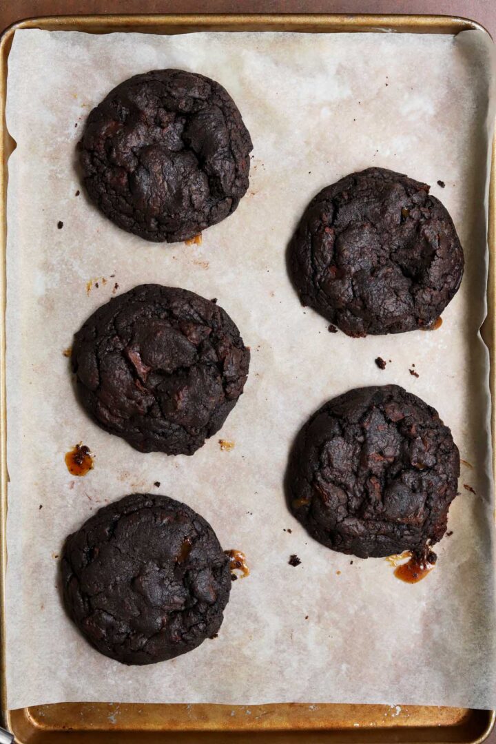 levain bakery coffee toffee cookies on baking sheet fresh out of the oven