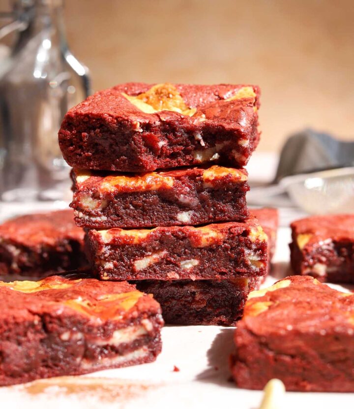 stack of red velvet brownies with bite