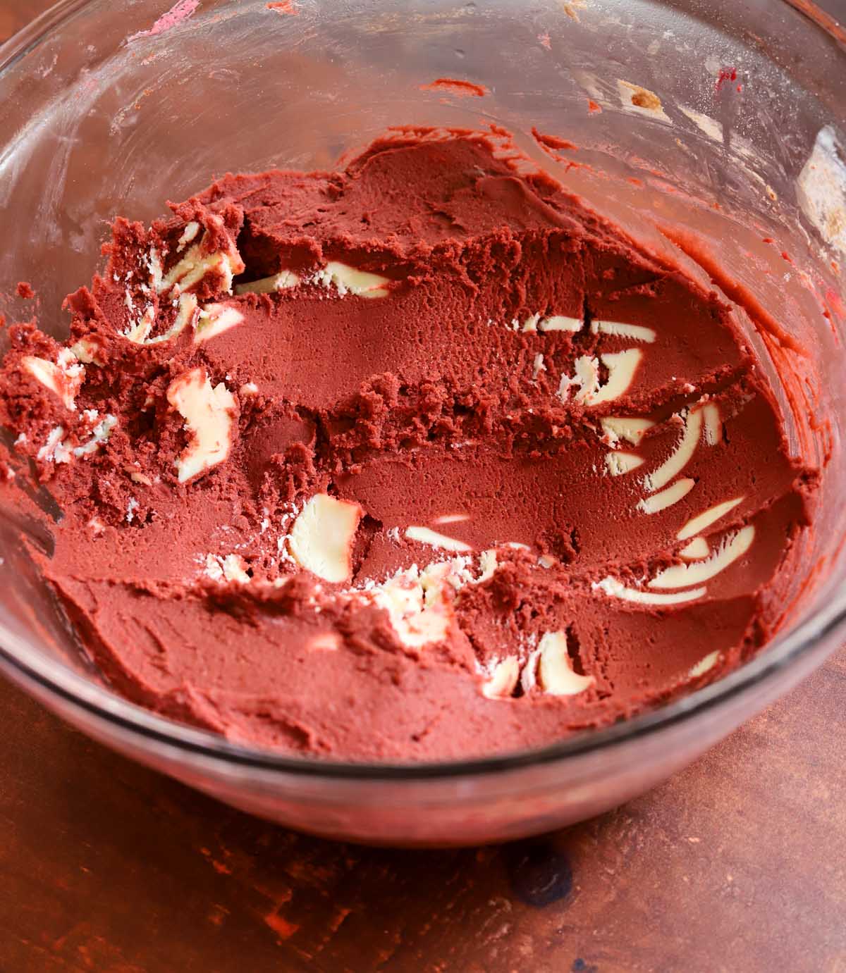 red velvet cookie dough in a mixing bowl