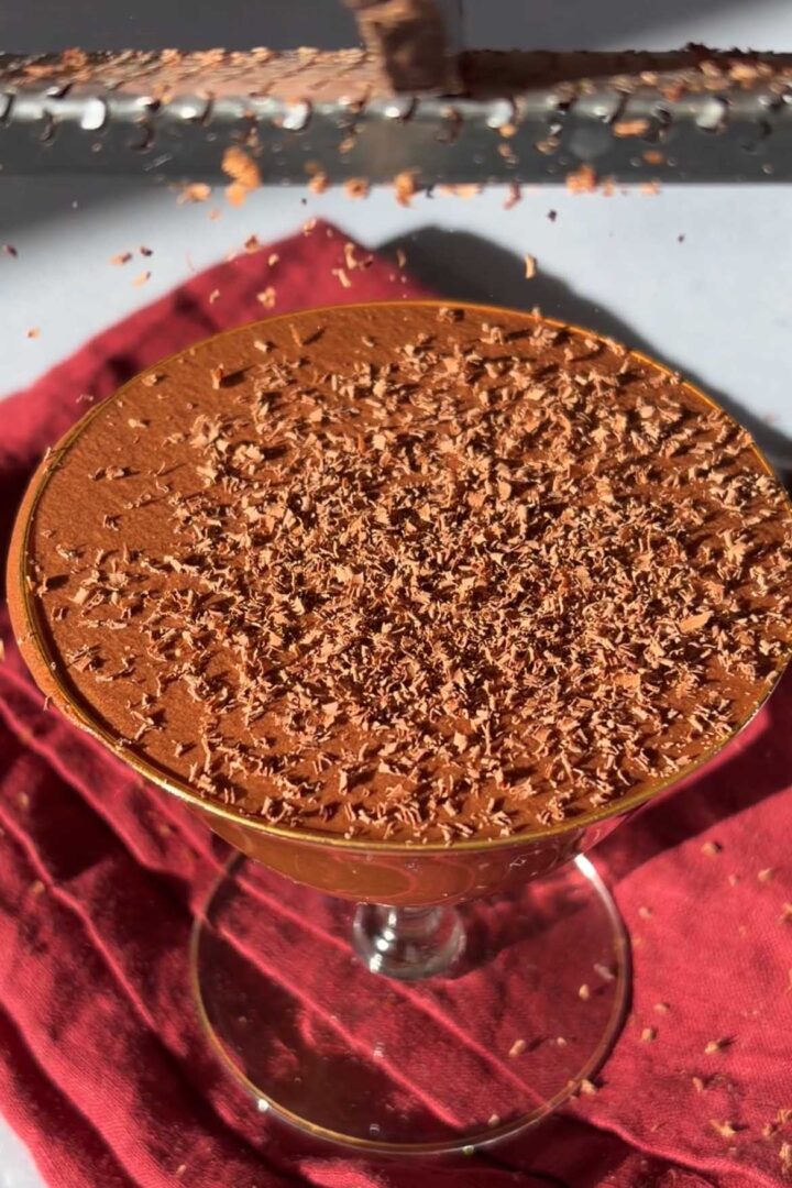 Grate dark chocolate over top.