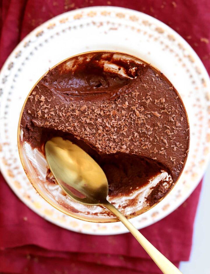 one ingredient chocolate mousse in dessert cup showing airy texture with spoon