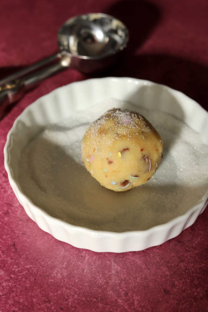 mini egg sugar cookie dough ball rolled in sugar