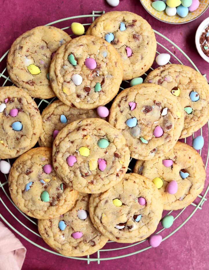 mini egg sugar cookies on wire cooling rack