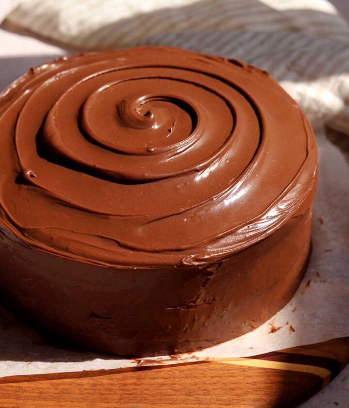 angle view of milk chocolate cake with milk chocolate frosting