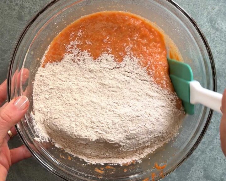 Add dry ingredients to wet ingredients and fold them in gently.