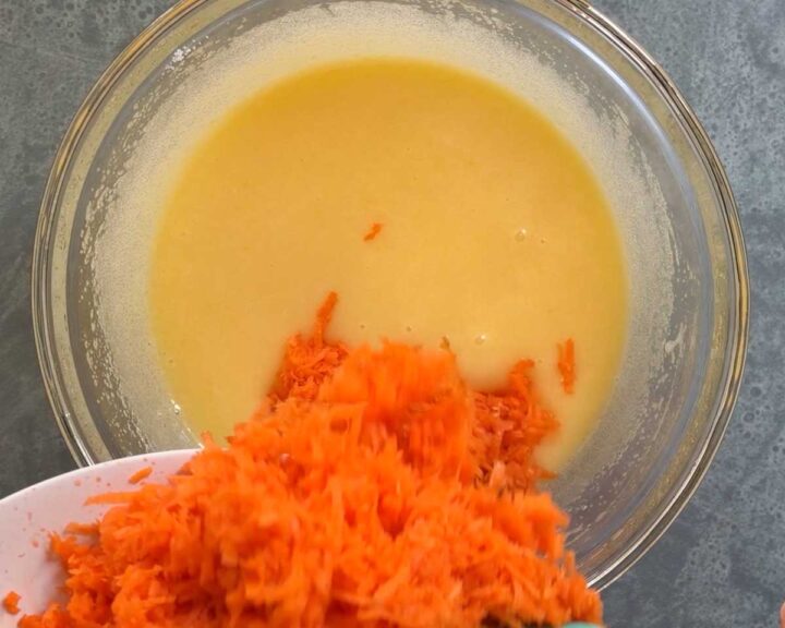 Add grated carrots.
