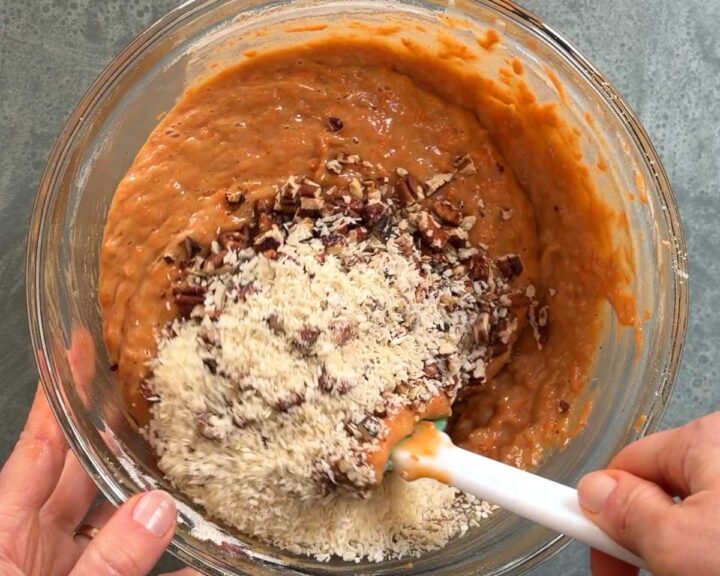 Add chopped pecans and coconut and fold them through gently.