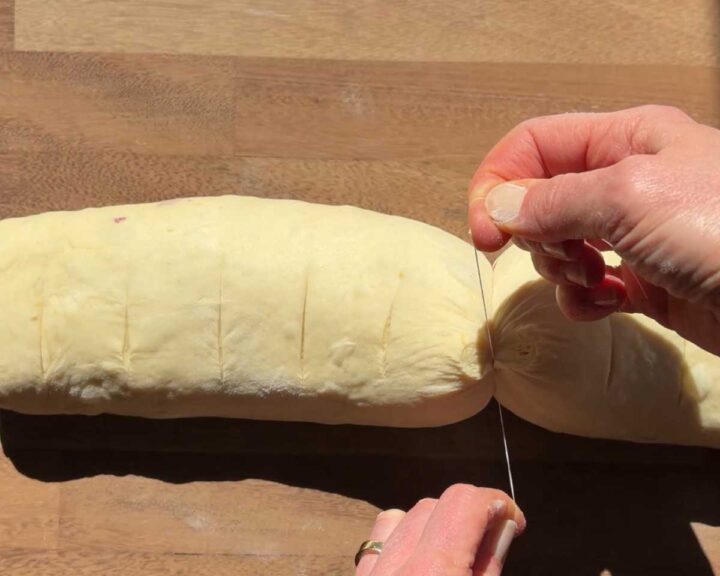 Make incisions to mark the places where you will slice the dough.