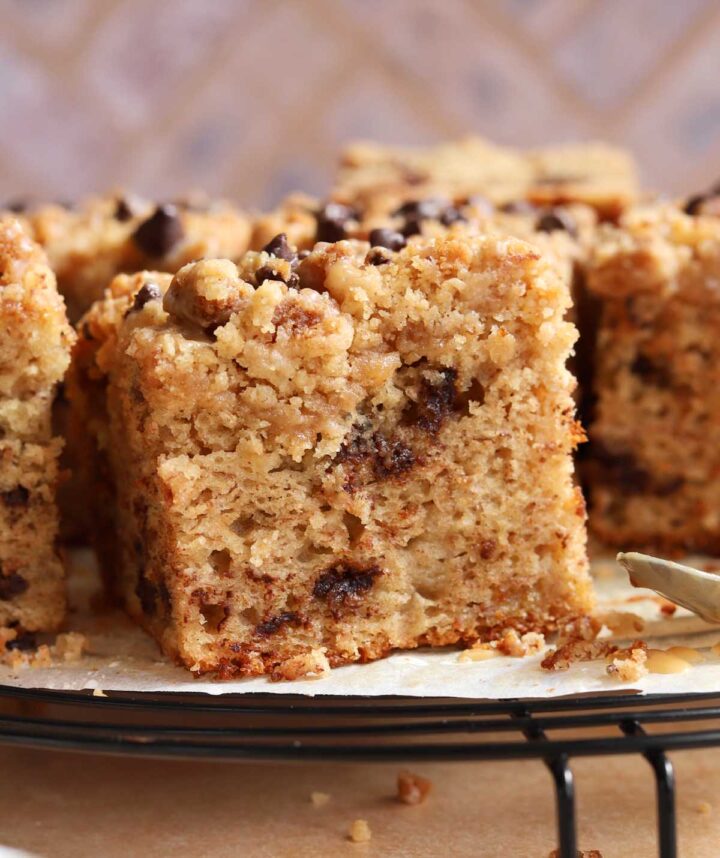 chocolate chip banana bread coffee cake sliced on cooling rack