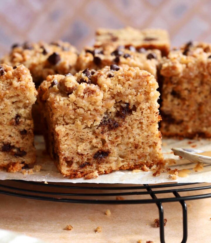 chocolate chip banana bread coffee cake sliced on cooling rack