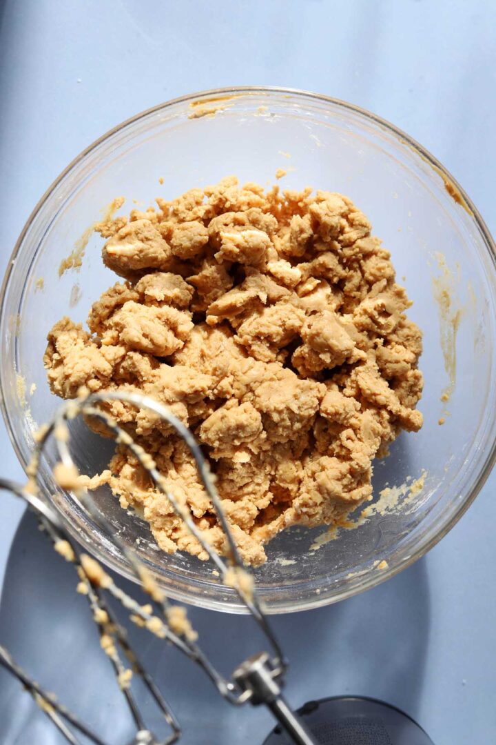 mixing peanut butter filling for Reese's chocolate peanut butter eggs