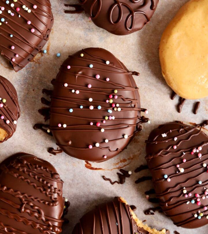 Reese's chocolate peanut butter eggs dipped in chocolate on baking sheet