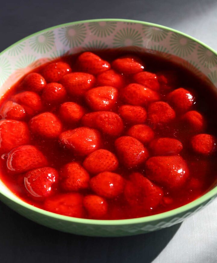strawberry sauce topping for cheesecake in a bowl