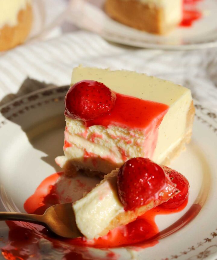 strawberry topping over cheesecake