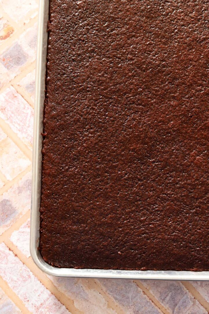 chocolate texas sheet cake cooled in baking sheet