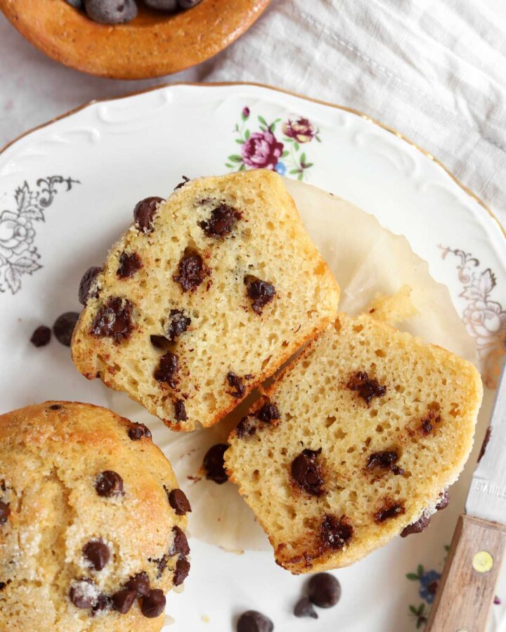 healthy Greek yogurt chocolate chip muffins sliced in half showing crumb texture