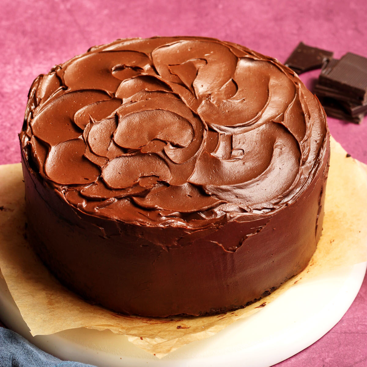 best moist chocolate cake on a plate before slicing
