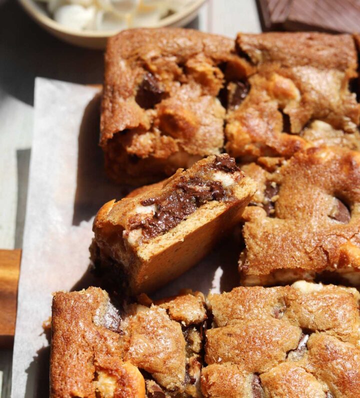 s'mores blondies sliced on cutting board showing square with cross-section