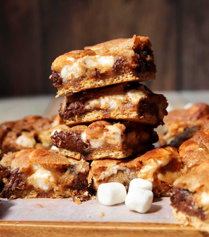 stack of s'mores blondies on parchment paper