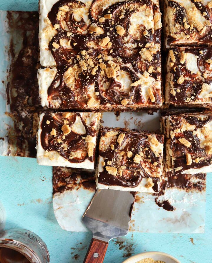 top view of no bake s'mores icebox cake sliced on parchment paper