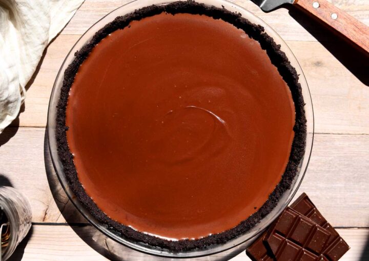 whole no bake chocolate pie in pie dish after chilling 8 hours