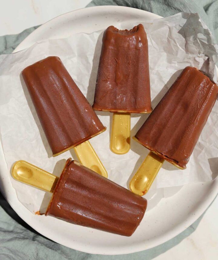 homemade fudgsicles on a plate over ice