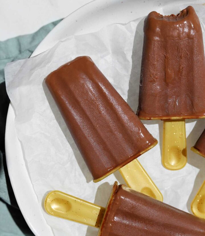 homemade fudgsicles on a plate over ice