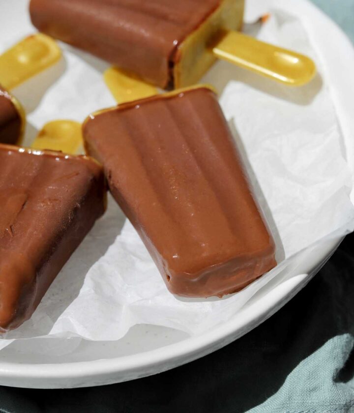 homemade fudgsicles on a plate over ice