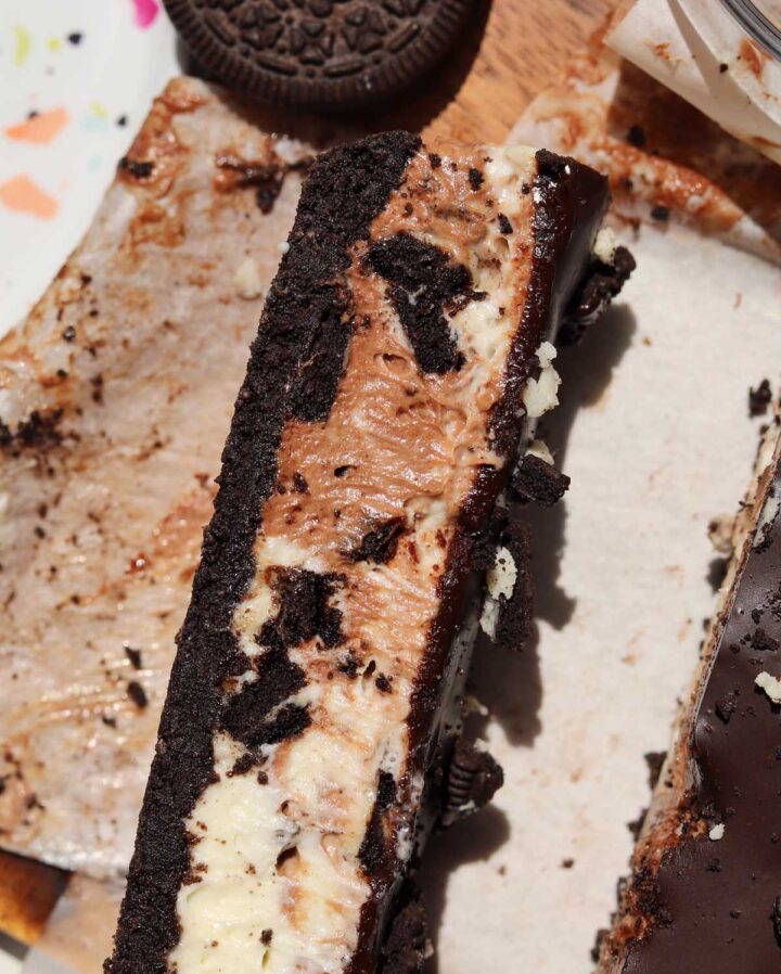 top view of no bake Oreo cheesecake bar on cutting board