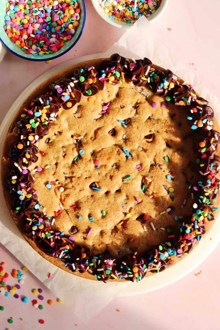 top view of chocolate chip cookie cake with chocolate ganache frosting