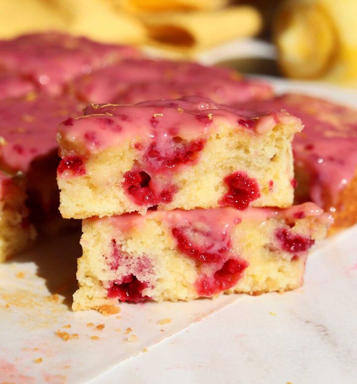 raspberry lemonade brownies split in half and stacked showing fudgy center