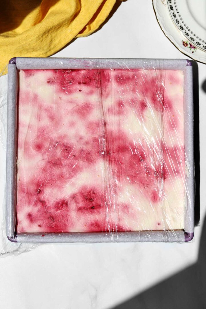 raspberry lemonade icebox cake in pan after chilling